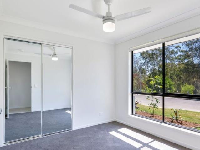 FAMILY HOME IN LOGAN RESERVE!
