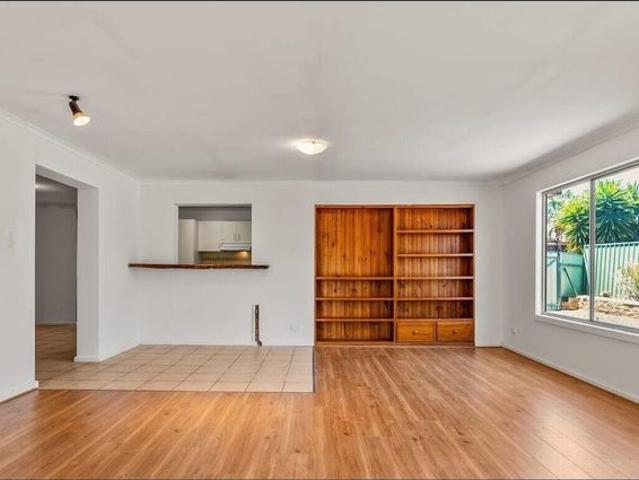 Family Home of 4 Bedrooms & 2 Living areas on Large Block