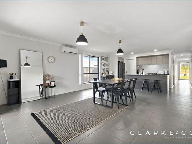 FAMILY HOME OFFERING SPACE, STYLE & EASY LIVING!