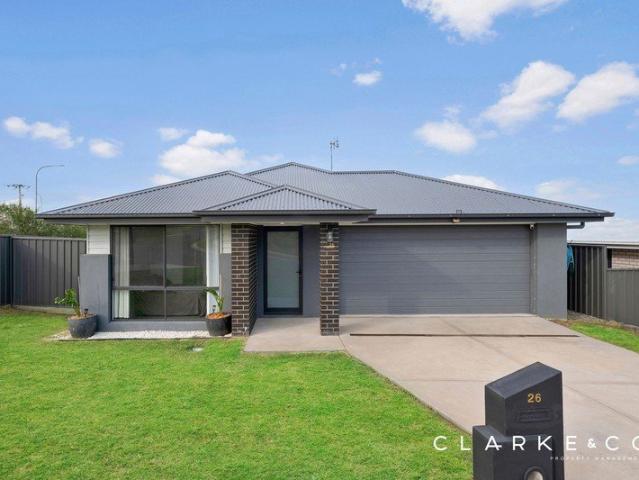 FAMILY HOME OFFERING SPACE, STYLE & EASY LIVING!