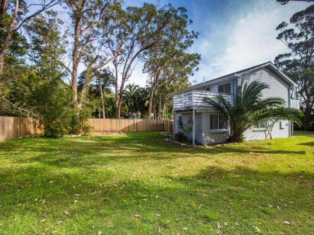 Family Home set on a flat fenced yard