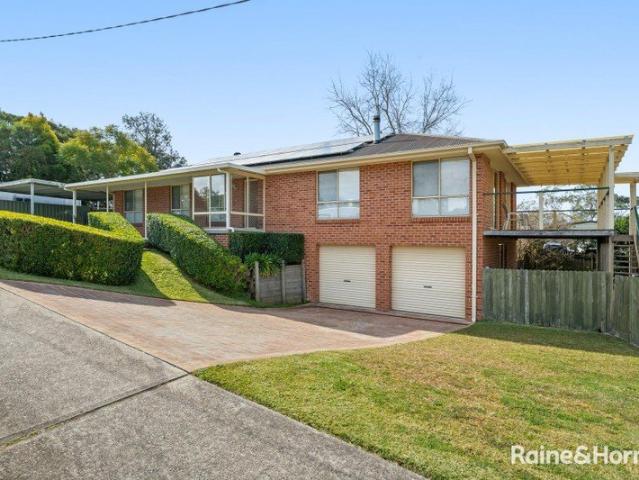 Family home set on a private 1,131sqm battle axe block