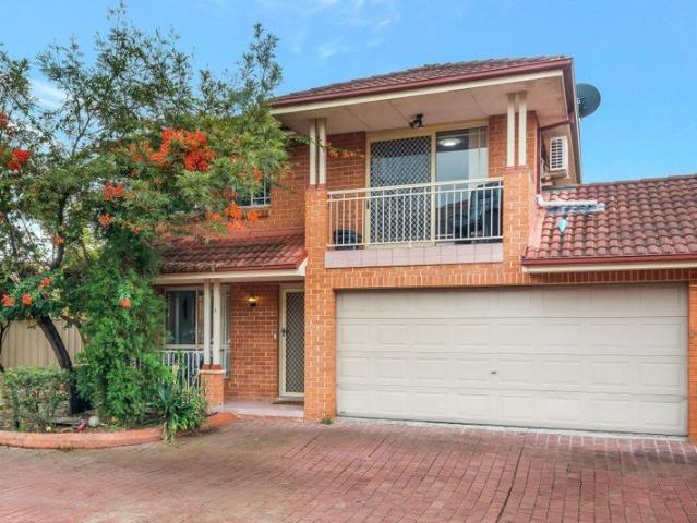 Family living over two levels with a private backyard and double garage