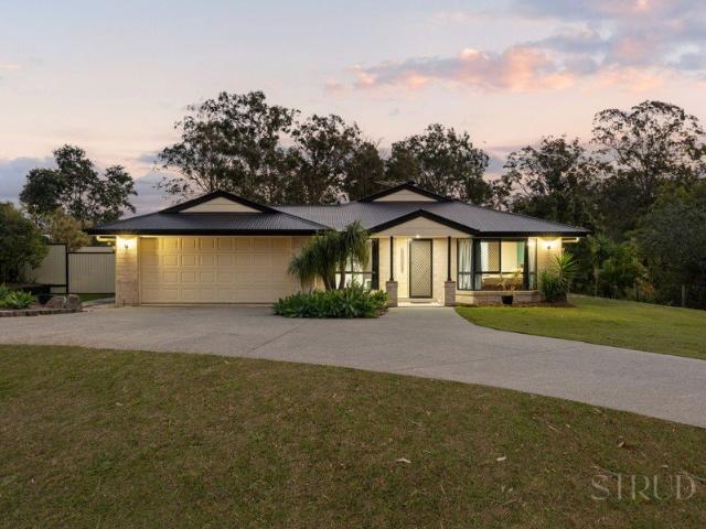 Family Living on a Flat Acre with Space to Grow