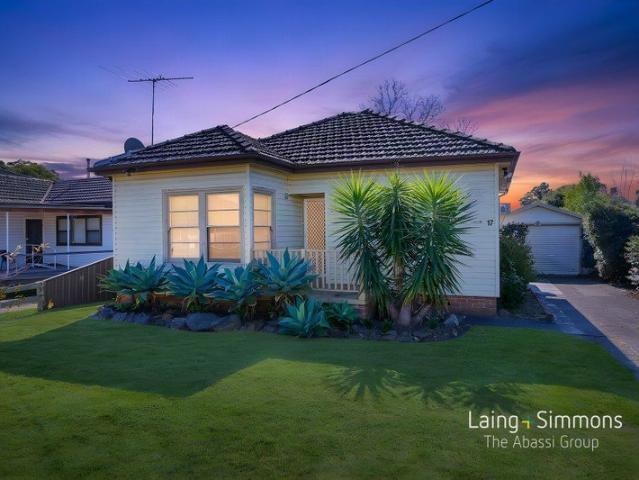 Family Living On A Large Block In The Heart Of Colyton