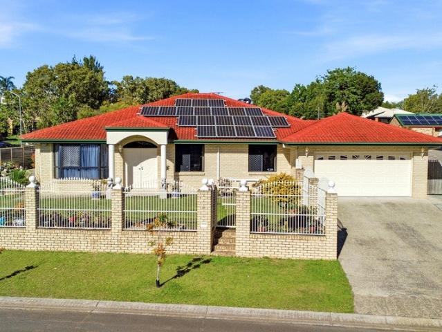 Family living at its finest: 5 beds, 2 living zones + a big yard