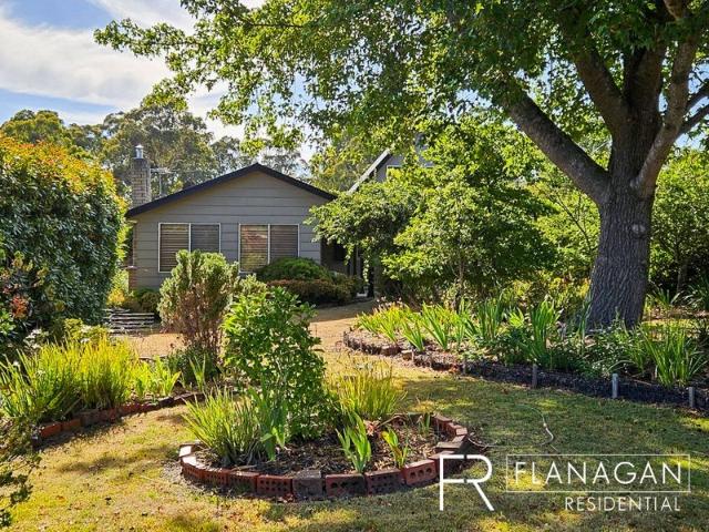 Family Living Set Amidst 1 Acre of Manicured Gardens