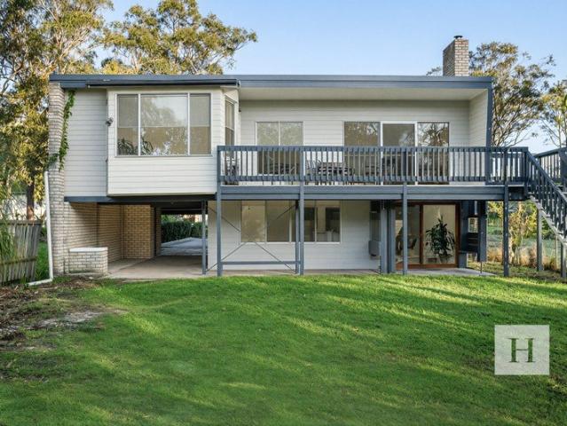 Absolute Creekfront Living with Space to Unwind