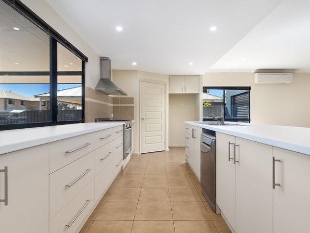Family Living with a Poolside Twist in Sought After Baynton