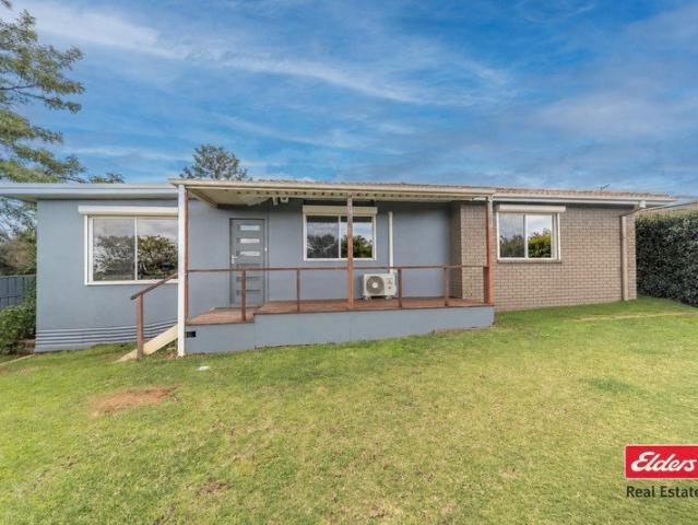 FAMILY LIVING WITH A SHED TO IMPRESS
