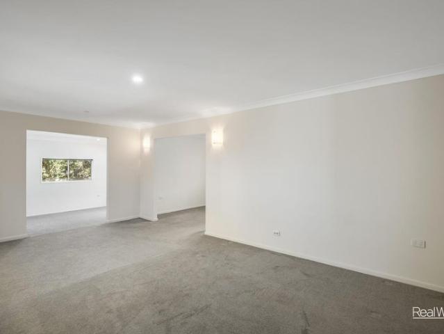 Family Living with Pool & Multiple Living Areas in Prime Rangeville Location