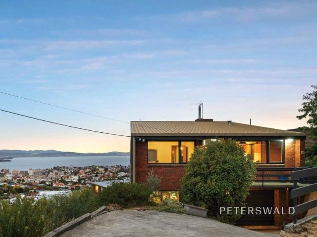 Family living with panoramic river views in West Hobart
