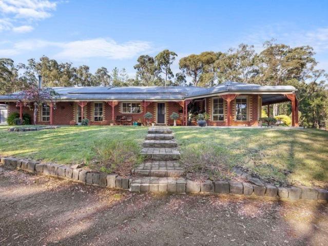 Family Lifestyle Retreat Bordering Enfield State Forest on 2.8 Acres