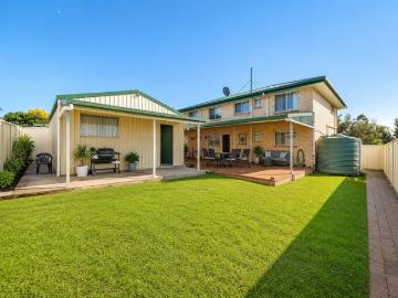 Family Space, Endless Storage & Exceptional Outdoor Living!