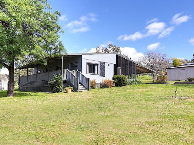 Fantastic home with a large shed on two acres