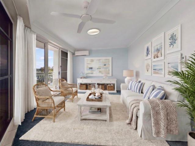 VACANT POSSESSION! GREAT HINTERLAND & BROADWATER VIEWS FROM TOP FLOOR RENOVATED 'ATRIUM RESORT' APARTMENT