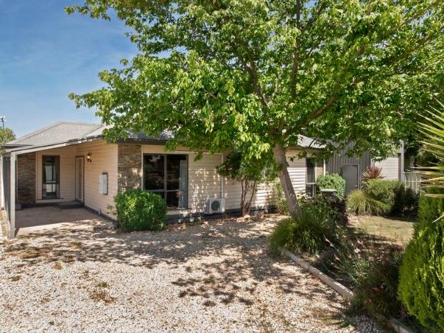 Fantastic Location Private, Low Maintenance Living Just a Short Walk to Town