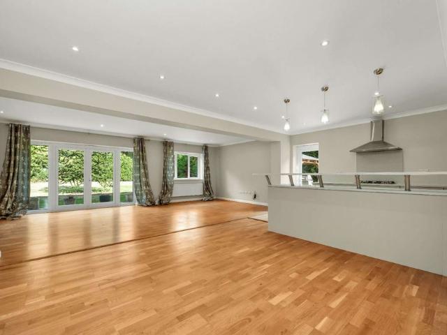 Fantastic seven bedroom family home set in within a mature 0.5 acre plot located in a prestigious private road in Esher