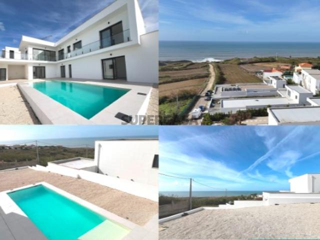 Fantástica Moradia V5 nova, nos acabamentos finais, com 5 suites, junto ao mar e às praias com acesso a pé, na região da Lourinhã Atalaia, 50 minutos de Lisboa 70 km, 378 m2 de construção, lote de terreno de 786 m2  Preço de oportunidade!