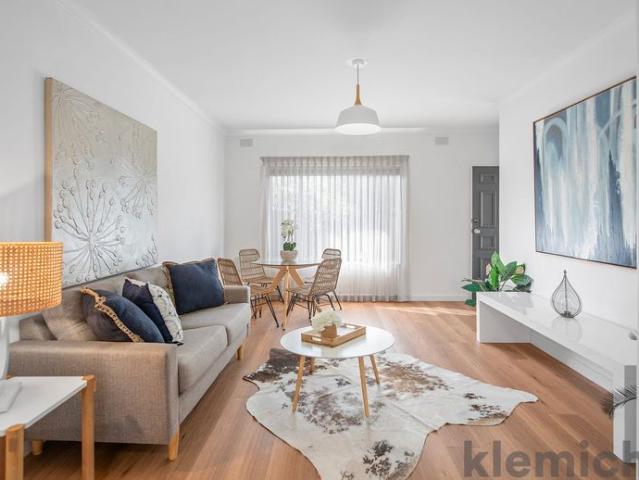 fabulous 2 BR unit with garage in quiet location