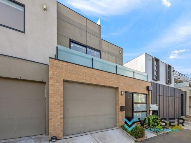 Fabulous Three Story Townhouse with Rooftop!