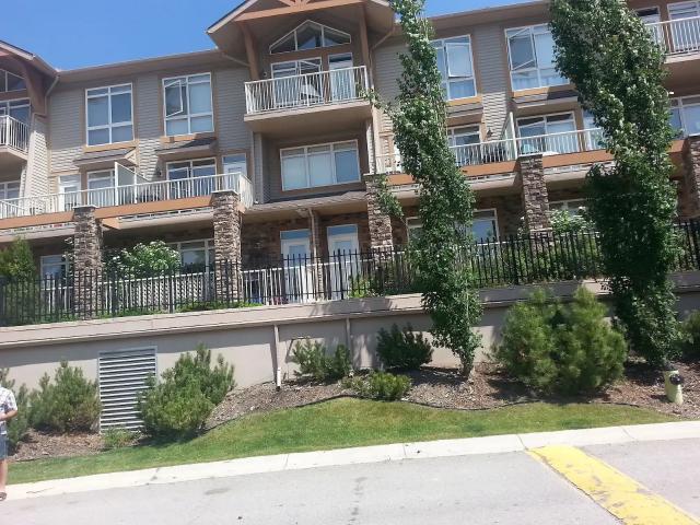 Fabulous condo in desirable Rocky Ridge — 1 Bedroom Condo Unit