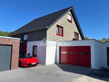 Farbenfrohes Einfamilienhaus Bj. 2024 mit moderner Technik, Pool, Sauna, Jacuzzi und großer Garage