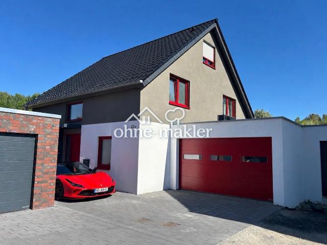 Farbenfrohes Einfamilienhaus Bj. 2024 mit moderner Technik, Pool, Sauna, Jacuzzi und großer Garage