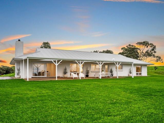 Farmhouse grace, horizon wide views, and 74 acres of country freedom.