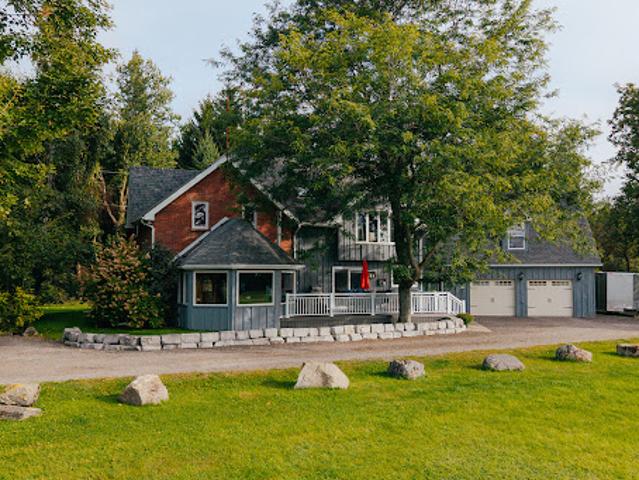 Farmhouse with outbuildings and garden