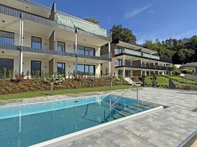 Fantastic Lake View Seeblickwohnung mit Infinity Pool und privatem Seezugang am Wörthersee