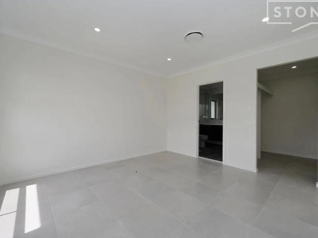 Feature packed near new build!