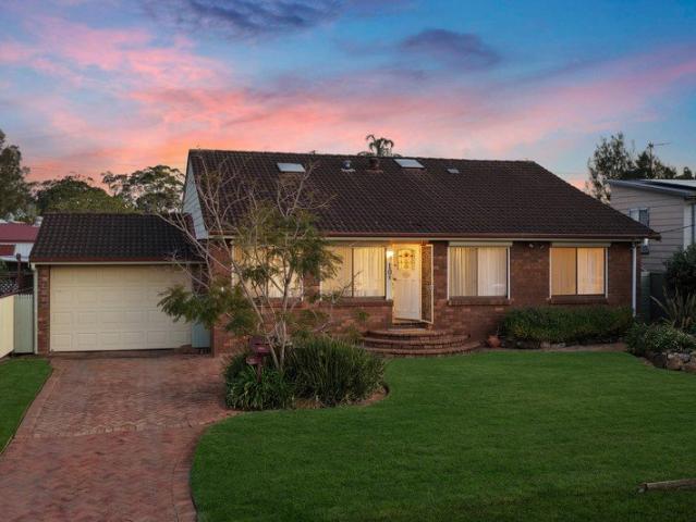 Charming single level four bedroom residence