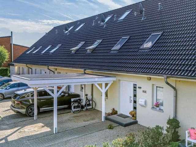 Feierabend im Hellen & Grünen: Perfekt gepflegtes Reihenmittelhaus mit Sonnenterrasse & Carport