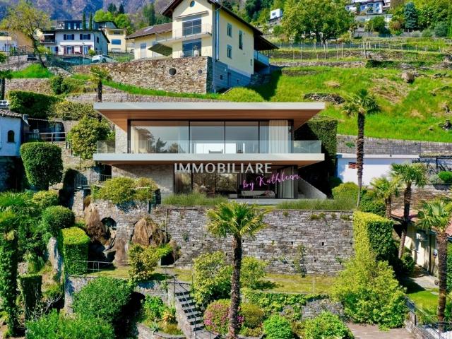 Ferienhaus mit fantastischem, unverbaubarem Seeblick, Garten + Garage