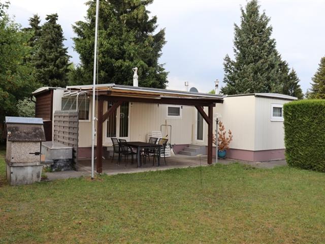 Ferienidylle in Lignières – 3.5 Zimmer Häuschen mit Terrasse