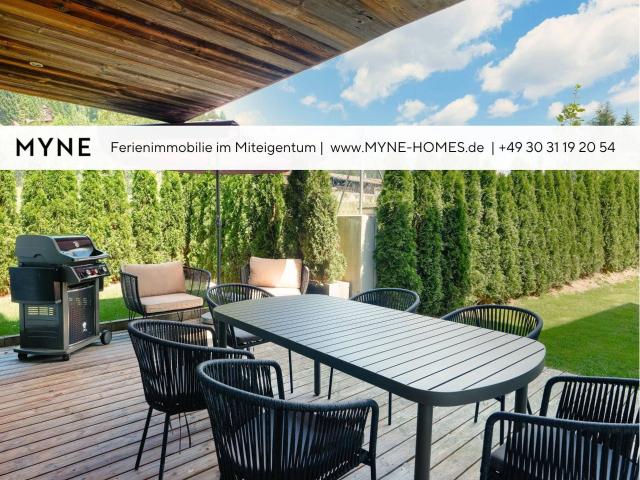 Ferienimmobilie im Miteigentum: Moderne Gartenwohnung mit Terrasse und privater Sauna