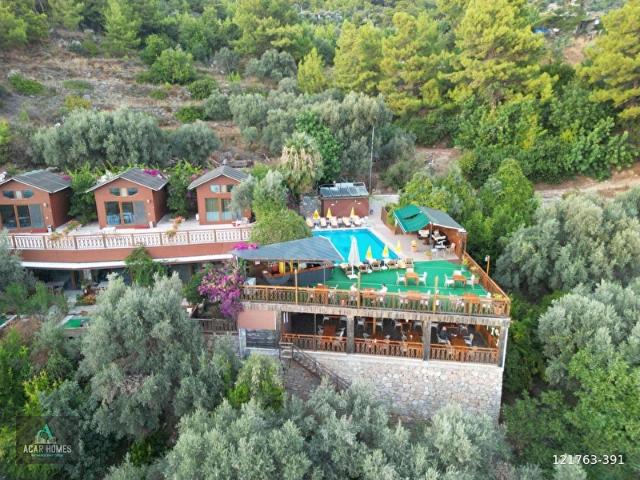 FETHİYE FARALYA KABAKTA SATILIK BUTİK OTEL TAŞ DUVARLA ÇEVRİLİ