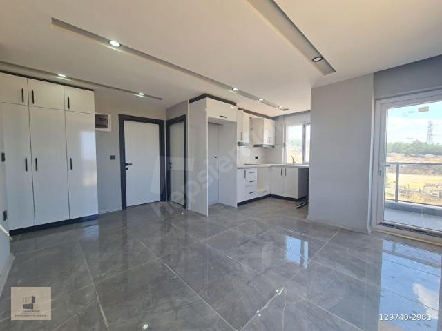 FEVZİÇAKMAK MAH. YERDEN ISITMALI 1.KAT 2+1 95 M ASANSÖRLÜ DAİRE