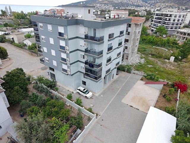 FİNİKE ADLİYE ARKASINDA DENİZE YAKIN 150mt EŞYALI SATILIK1+1