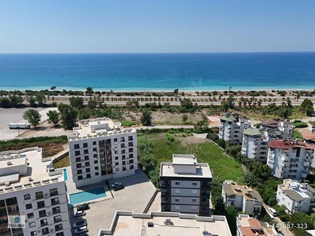 FİNİKE HASYURT DENİZE SIFIR ÖNÜ KAPANMAZ SATILIK 2+1 DAİRE