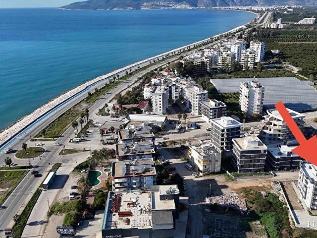 FİNİKE SAHİLDE DENİZ GÖRÜR VE ARA KAT FIRSAT 2+1 DAİRE