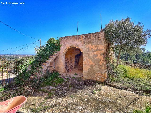 Finca rústica histórica en Santa Eugènia con vistas a la montaña y cueva natural