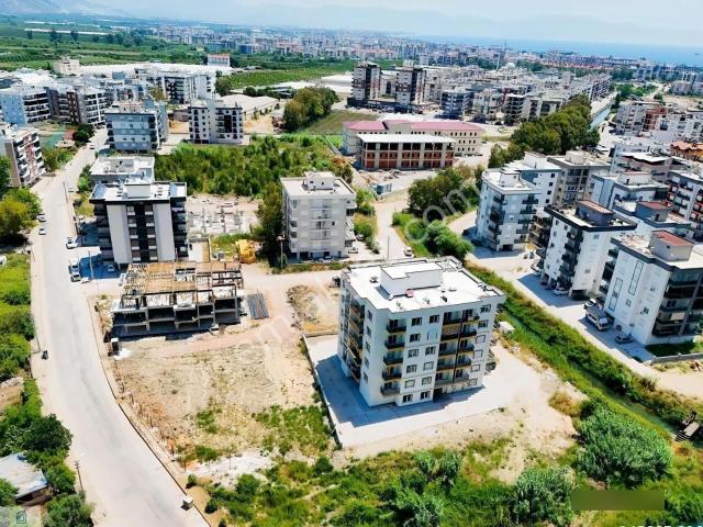 Finike İskele'de Modern Mimarili Projeden 1+1 Daireler