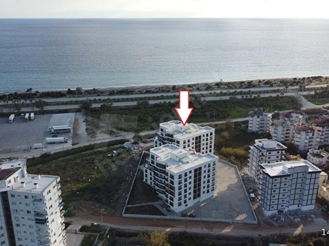 Finike Sahilde Lüks Projede Deniz Manzaralı Satılık 1+1 Rezidans