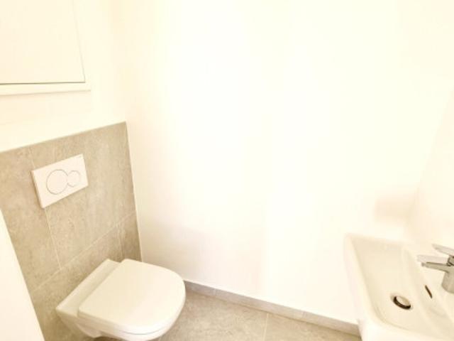 Fire Sale! Hausfeeling Familien Hit! Townhouse mit Garten + Erdwärme + Absolute Ruhelage + Tiefgarage + Ideale Süd Ausrichtung! Nachhaltig und zukunftssicher investiert!