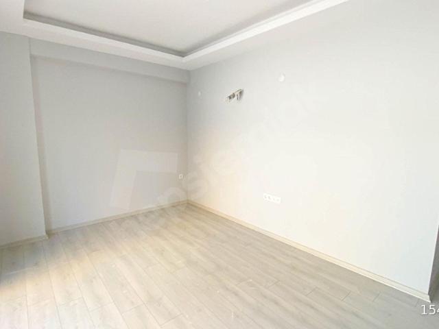 FIRSAT SIFIR HAVUZLU YERDEN ISITMALI 1+1 BAHÇE KATI DAİRE