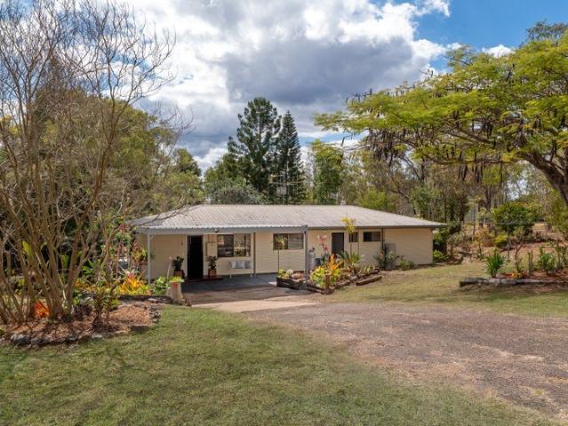 First Time Offered in Almost 26 Years Renovated Country Living with Serious Shed Space