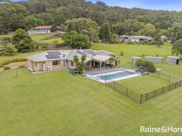First Time Offered Spacious Coastal Acreage Living on 2.5 Acres