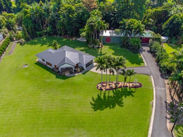 FIRST TIME ON MARKET. Modern, Immaculate, Tropic Paradise, Rainforest by the Creek. Home 15 minutes to Mission Beach